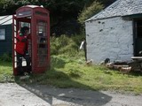 Telefonzelle mit H�hnern auf Canna